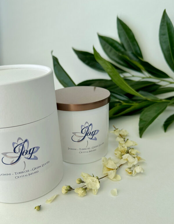 Joy Intention Candle with Jasmine and green leaves